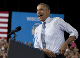 President Barack Obama speaks at the University of Wisconsin at La Crosse, in La Crosse, Wisc., Thursday, July 2, 2015, about the economy and to promote a proposed Labor Department rule that would make more workers eligible for overtime. (AP Photo/Carolyn Kaster)