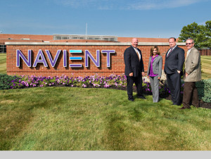 /Local officials joined Navient leaders to unveil the company's new exterior sign. (From left to right: Mayor Thomas Leighton; Lisa Stashik, Navient; Troy Standish, Navient; Mark Davis, Office of Sen. Yudichak) (GLOBE NEWSWIRE)/